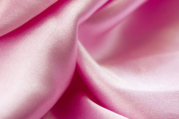 Texture de tissu de luxe satin peut utiliser comme vacances abstraites. Contexte de conception abstrait. Soie rose brillante élégante et lisse
 - Photo, image