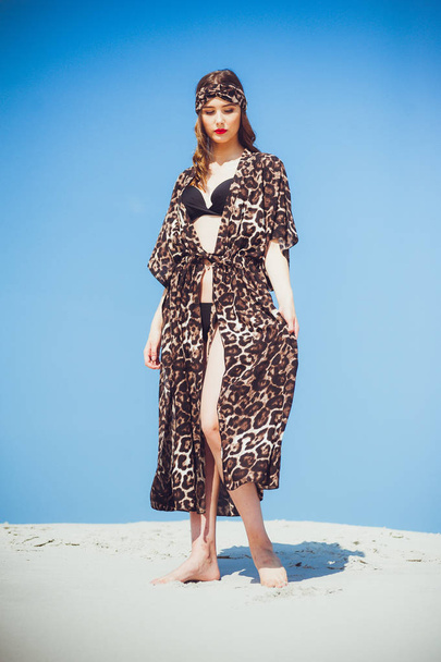 Leopard print swimwear beautiful young woman portrait - 写真・画像