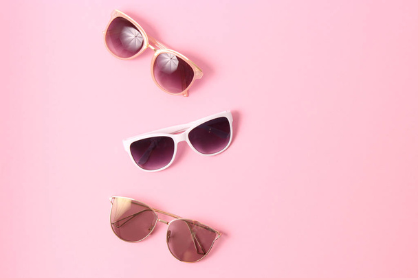 set of sunglasses on a colored background. - Fotografie, Obrázek