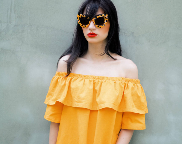 Young beautiful woman in sunglasses  posing  - Fotografie, Obrázek