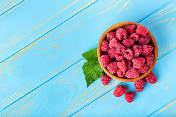 top view of raspberries in bowl - Φωτογραφία, εικόνα