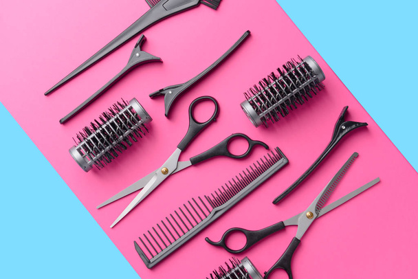 Set of hairdresser tools and accessories on color background - 写真・画像