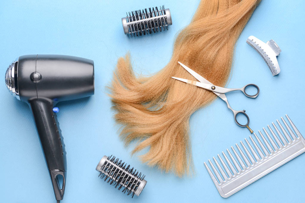 Hairdresser tools and accessories on color background - Fotografie, Obrázek