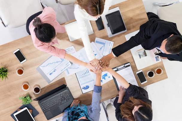 Teamwork business people join hands in meeting. - Foto, imagen