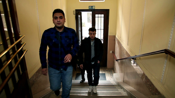 Students walking in school's corridor - Footage, Video