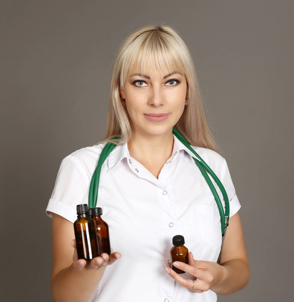 doctor holding medicine bottles - Photo, Image