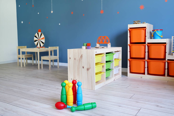 Stylish interior of modern playroom in kindergarten - Фото, зображення