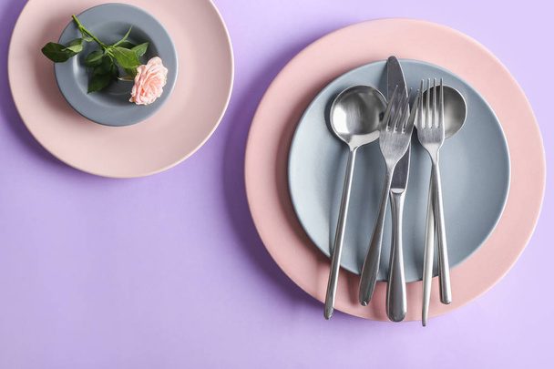 Simple table setting on color background - Foto, Bild