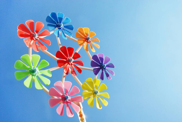 Colorful Pinwheels Toy with Blue Sky in Summer  - Photo, Image