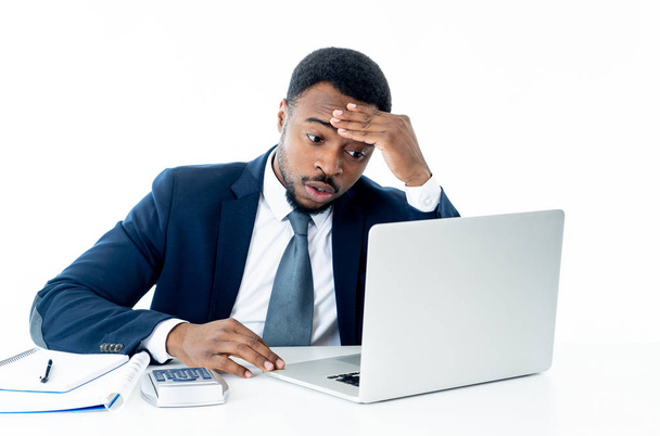 Angry and desperate african american entrepreneur businessman shouting at computer feeling tired and overworked at desk in People, Stress, Technology and Overtime concept isolated in white background. - Valokuva, kuva