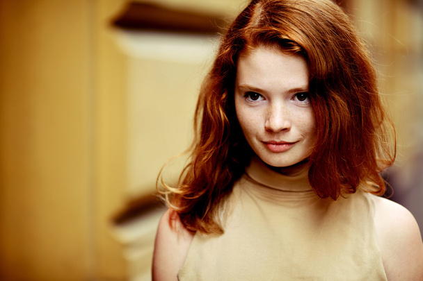 Portrait of a beautiful girl with freckles - Фото, зображення