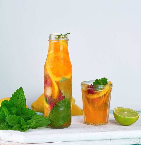 summer refreshing drink lemonade with lemons, cranberry, mint le - Photo, Image