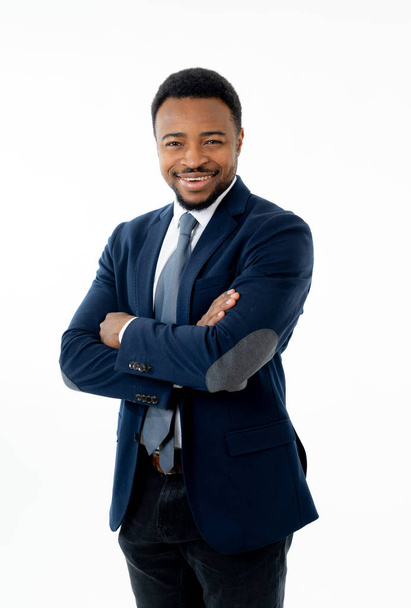 Half-length portrait of confident handsome african american businessman in fashion modern formal wear suit standing and looking happy. Isolated on white background. Concept of leadership and success. - Φωτογραφία, εικόνα