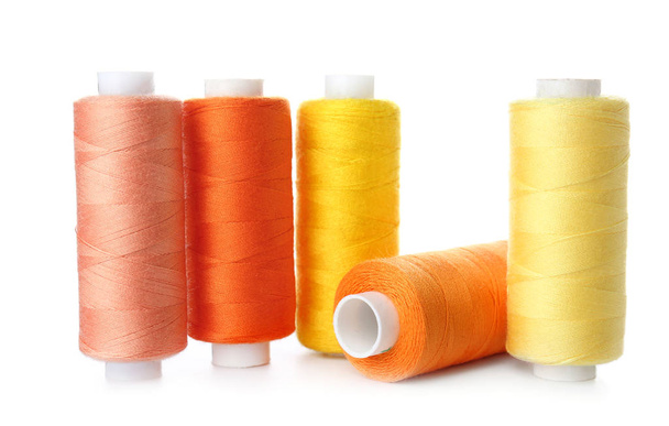 Bright sewing threads on white background - Photo, Image