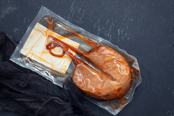 typical portuguese sausage Farinheira in plastic bag on ceramic  - Fotó, kép