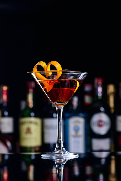classic manhattan cocktail decorated with orange hearts, romantic cocktail - Foto, Bild