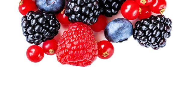 Berry mix isolated on a white background. Various fresh berries. - Fotó, kép