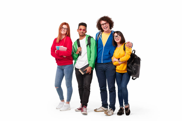 Cheerful multiethnic students looking at camera - Foto, afbeelding