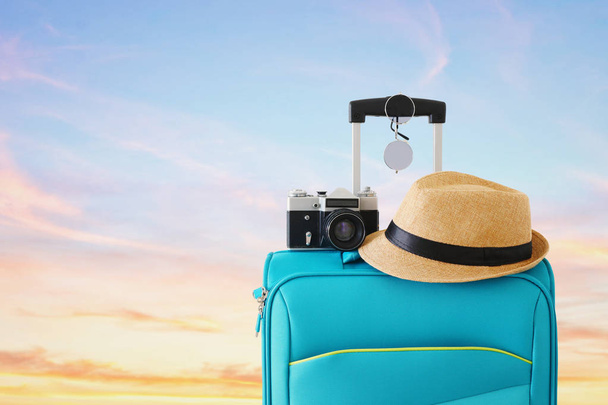 recreation image of traveler luggage, camera and fedora hat infr - Фото, изображение