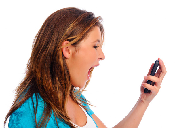 Shouting teen with cell phone - Foto, imagen