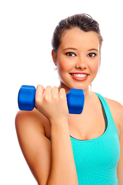 Pretty woman with dumbbells - 写真・画像