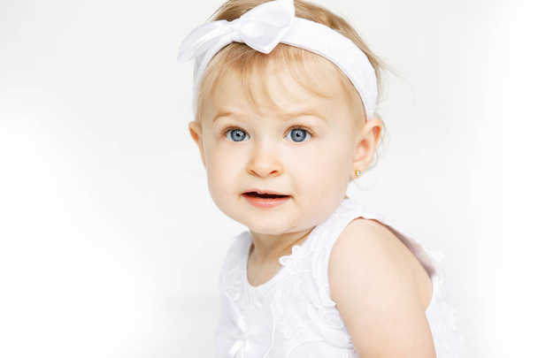 beautiful little girl all in white clothes - Photo, image