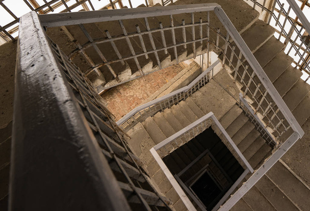 Top view of the spiral stairs in the church tower. Travels in Russia - Photo, image