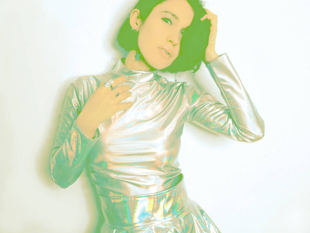 beautiful girl in trendy holographic space suit.  - Φωτογραφία, εικόνα
