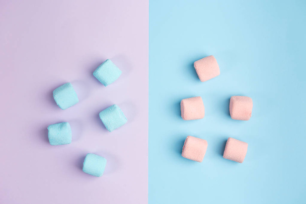 Marshmallow on blue and violet backgrounds. Two colors. Top view. - Photo, image