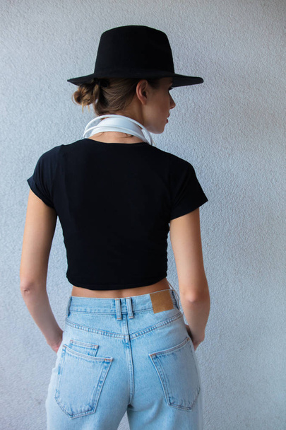 Young woman in hat and 90s style clothes - Fotoğraf, Görsel