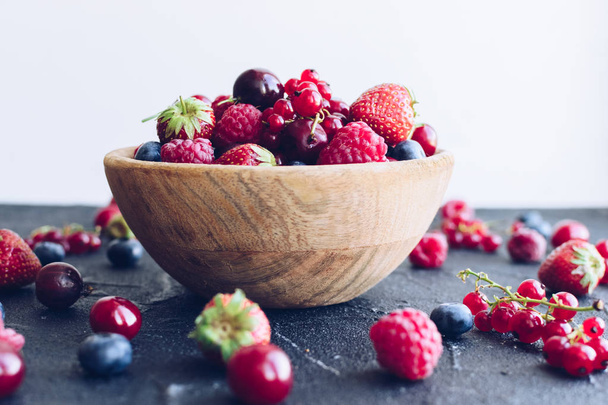 Bowl of various ripe berries - Photo, image