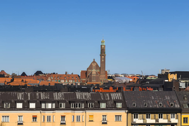 Engelbrekt Church towers above city rooftops - Foto, Imagen