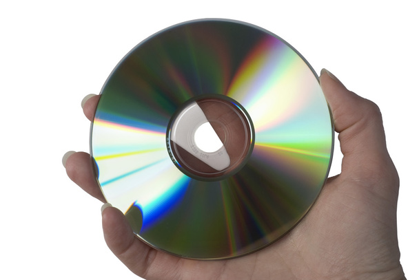 Compact Disc in hand. - Photo, Image