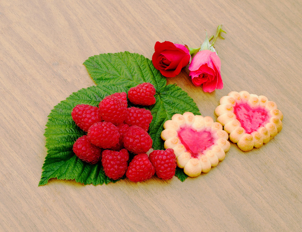 Heart-shaped cookies, rose and a cup of milk - 写真・画像