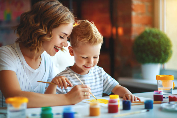 mother and child son  painting draws in creativity in kindergart - Photo, image