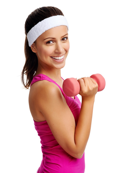 Woman working out with dumbbells - Foto, Imagen