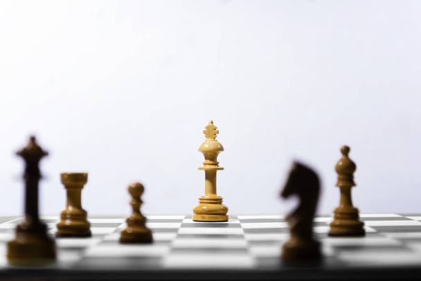 Wooden king chess piece standing  - Foto, imagen