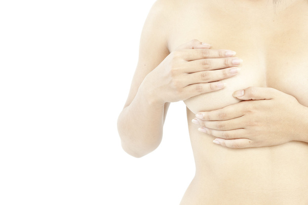 Woman covering her breasts - Фото, зображення