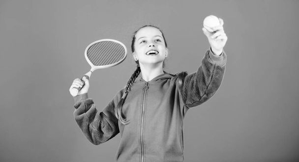 Tennis player with racket and ball. Tennis is fun. Childhood activity. Little girl. Fitness diet brings health and energy. Sport game. Happy child play tennis. Gym workout of teen girl. having fun - Photo, Image
