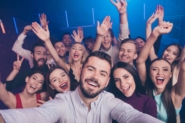 Self-portrait of nice-looking attractive lovely shine pretty adorable cheerful cheery positive glad excited ladies and guys having fun rest relax showing v-sign symbol at luxury fogged nightclub - Photo, Image