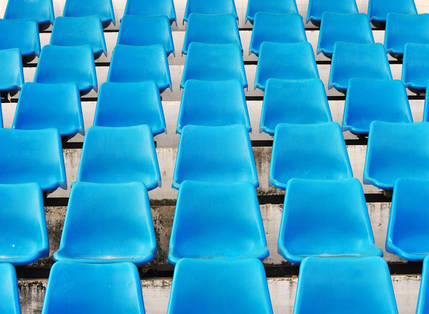 Синие сиденья на стадионе
 - Фото, изображение