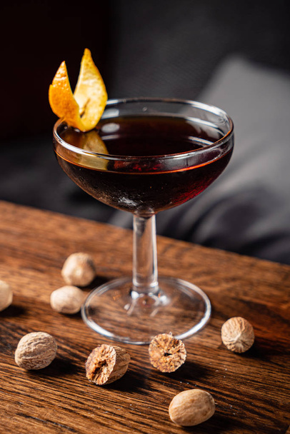 cocktail with nutmeg on the wooden table - Foto, Imagem