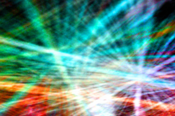 Abstract blurred background of diffused beams of colored light on the wall - Photo, Image