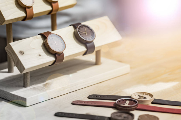 Wooden wrist watch with leather strap - Valokuva, kuva