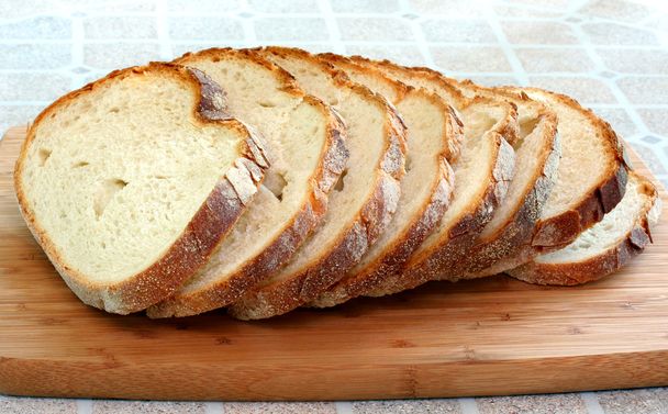 Hoja fresca de pan rebanado
 - Foto, Imagen