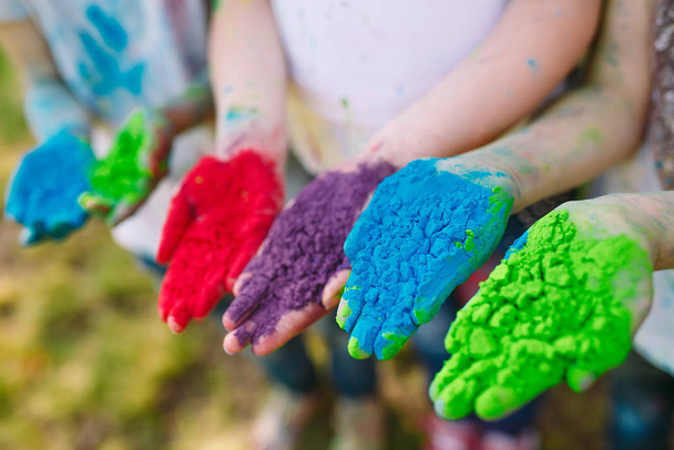 Hands Palms of young people covered in purple, yellow, red, blue Holi festival colors isolated. - Foto, Imagem