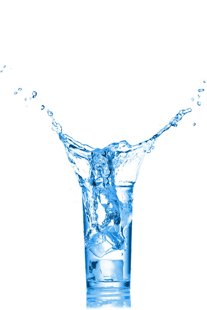 Water splashes in the glass on white background - Foto, Imagen