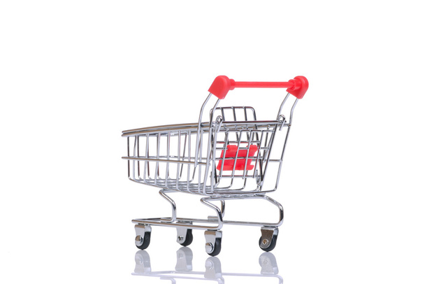 Shopping cart isolated on the white background - Foto, imagen