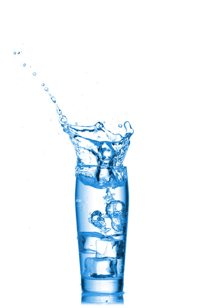 Water splashes in the glass on white background - Photo, Image