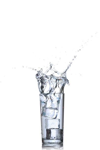 Water splashes in the glass on white background - Foto, immagini